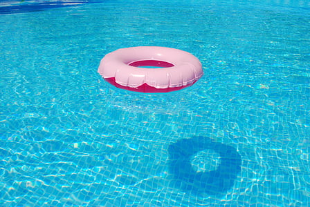 white and red buoy on blue swimming pool thumbnail
