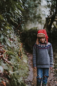 selective focus photography of children walking near green grass thumbnail