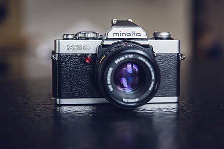 photo of black and gray Minolta XG3 DSLR camera thumbnail