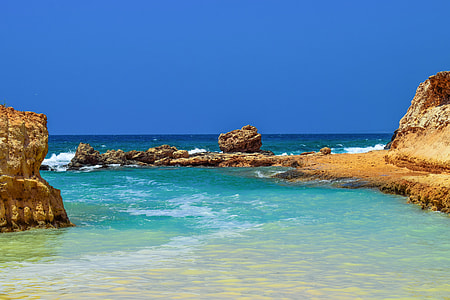 island near body of water thumbnail