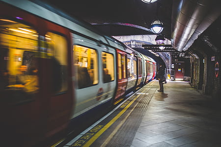 person standing in front of train thumbnail