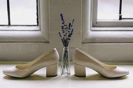 pair of white chunky high-heel shoes thumbnail