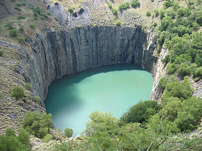 aerial photo of lake near trees at daytime thumbnail