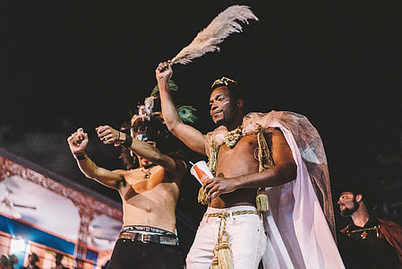 man wearing white cape thumbnail