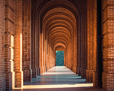 pathway inside brown brick building thumbnail