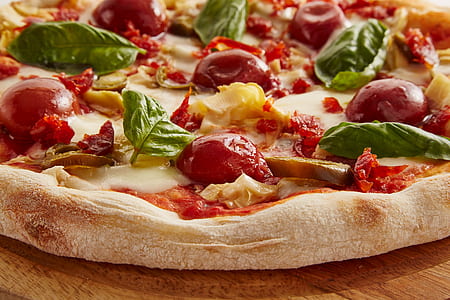 baked pizza with spinach, cherry tomatoes and cheese thumbnail