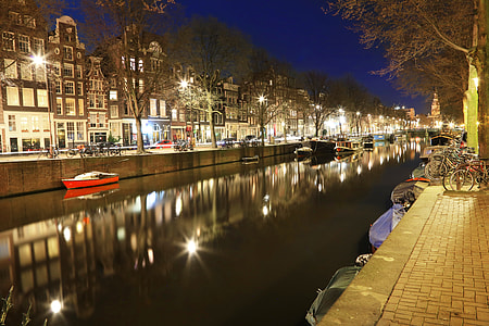 boats on canal in city thumbnail