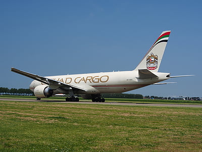 white airliner on runway thumbnail