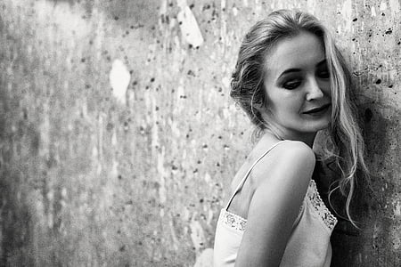 grayscale photo of woman wearing sleeveless tops thumbnail