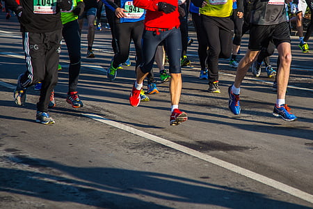 photography of marathon people running on roadway thumbnail