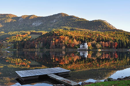 black dock near mountain thumbnail