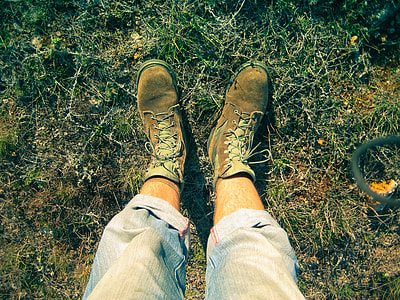 person standing on green lawn thumbnail