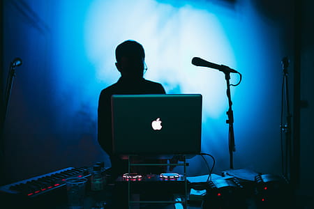 DJ In Blue Light Photo thumbnail