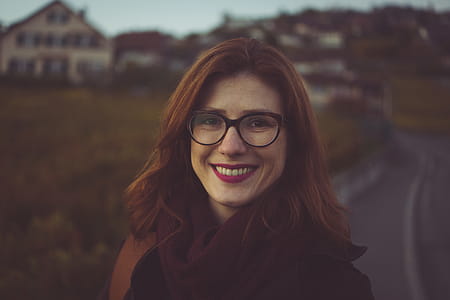 Closeup Photo of Woman Wearing Eyeglasses thumbnail