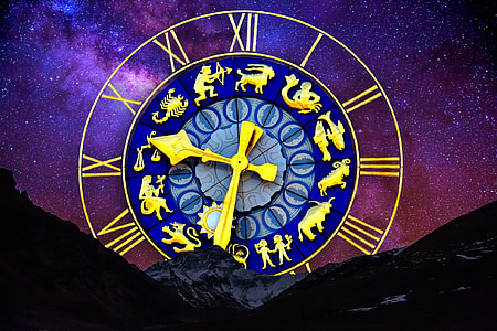 round blue and gold analog clock thumbnail
