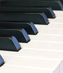 close-up photography of piano keys thumbnail