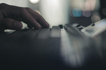 shallow focus photography of human hand thumbnail