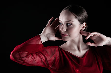 woman putting hand on her head facing sideways thumbnail