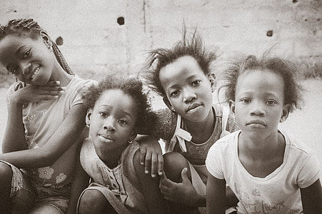 four children n grayscale photography thumbnail