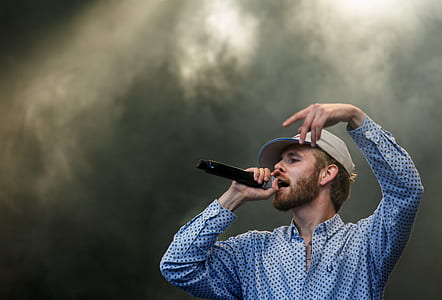 man holding microphone thumbnail