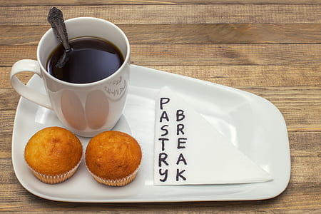 white ceramic coffee mug on white ceramic platter thumbnail