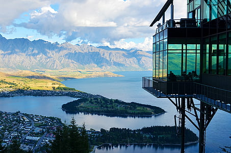 aerial photography of city and mountain during daytime thumbnail