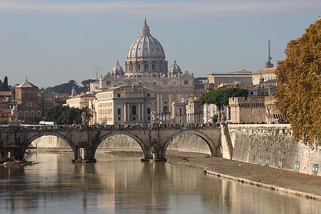 concrete bridge near dome building during daytime thumbnail