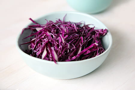 purple slice cabbage in white ceramic bowl thumbnail