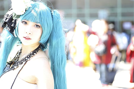 selective focus photography of woman wearing cosplay costume during daytime thumbnail