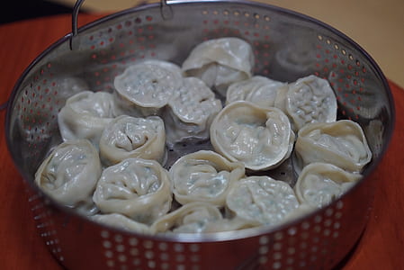 selective focus photography of dumplings thumbnail