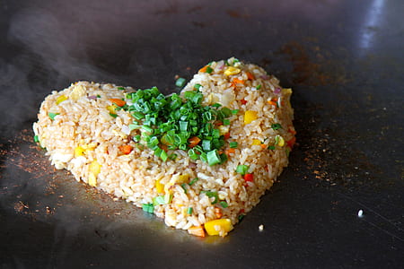 heart-shape rice on brown surface thumbnail