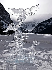 clear glass art under white sky thumbnail