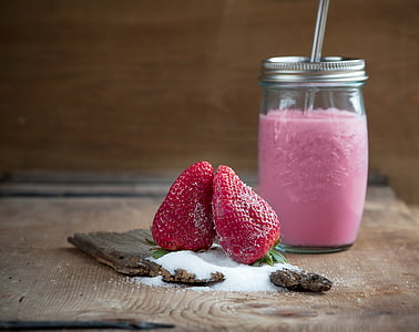 strawberries on top of wooden chopping board thumbnail