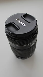 black Canon camera lens thumbnail