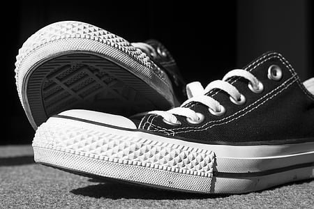 pair of black-and-white Converse low-top sneakers thumbnail