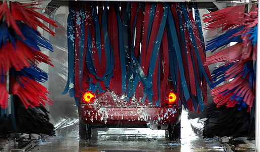 selective focus photography of red vehicle thumbnail