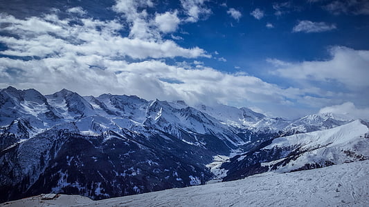 gray and white mountain hills under white sky thumbnail