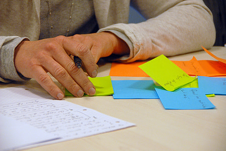 person with assorted-color sticky notes thumbnail