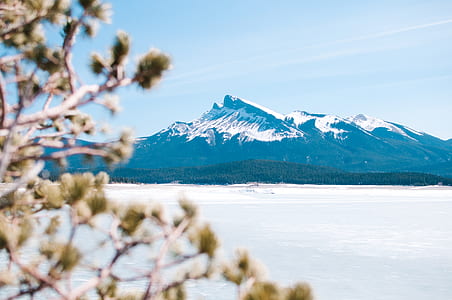 landscape photography of mountain covered with snow during daytime thumbnail