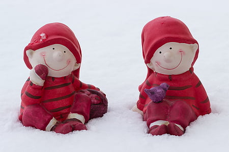 Christmas-themed boy ceramic figurine thumbnail