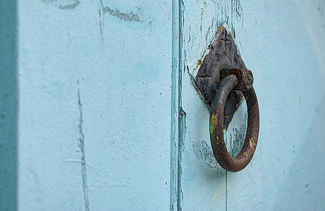 black door knocker on door thumbnail