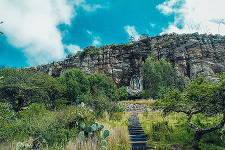 Black Concrete Staircase and Massive Mountain thumbnail