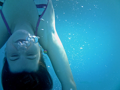 underwater closeup photo of woman thumbnail