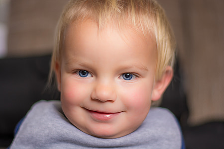 selective focus photography of a smiling baby thumbnail