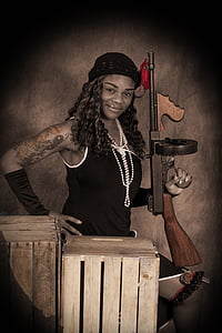 woman holding rifle thumbnail