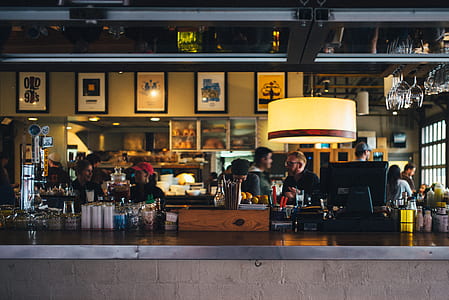 group of person sitting inside restaurant photograph thumbnail