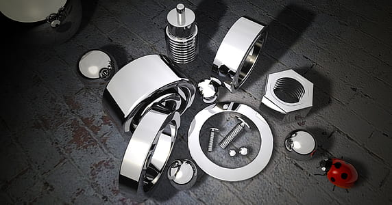 gray stainless steel bolts and nuts near ladybug thumbnail