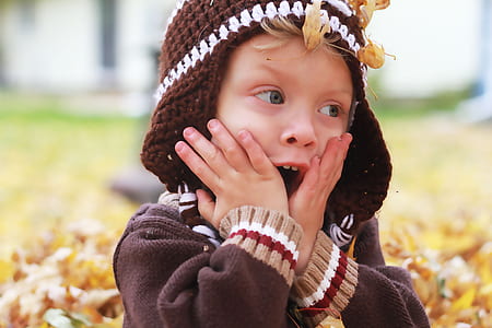 toddler opening its while covering hands thumbnail