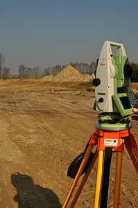 white and green theodolite during daytime thumbnail