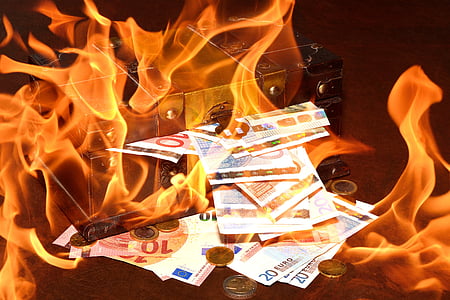 banknotes with flame thumbnail